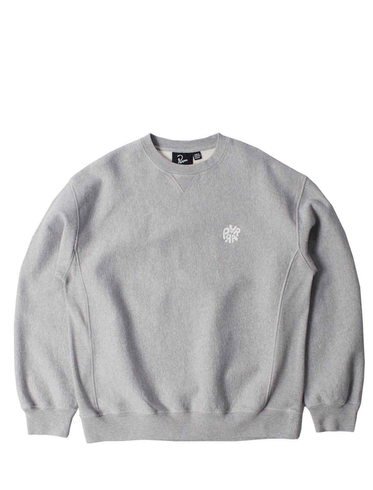 A light gray crewneck sweatshirt with a small white embroidered logo on the left chest, displayed flat against a solid white background.
