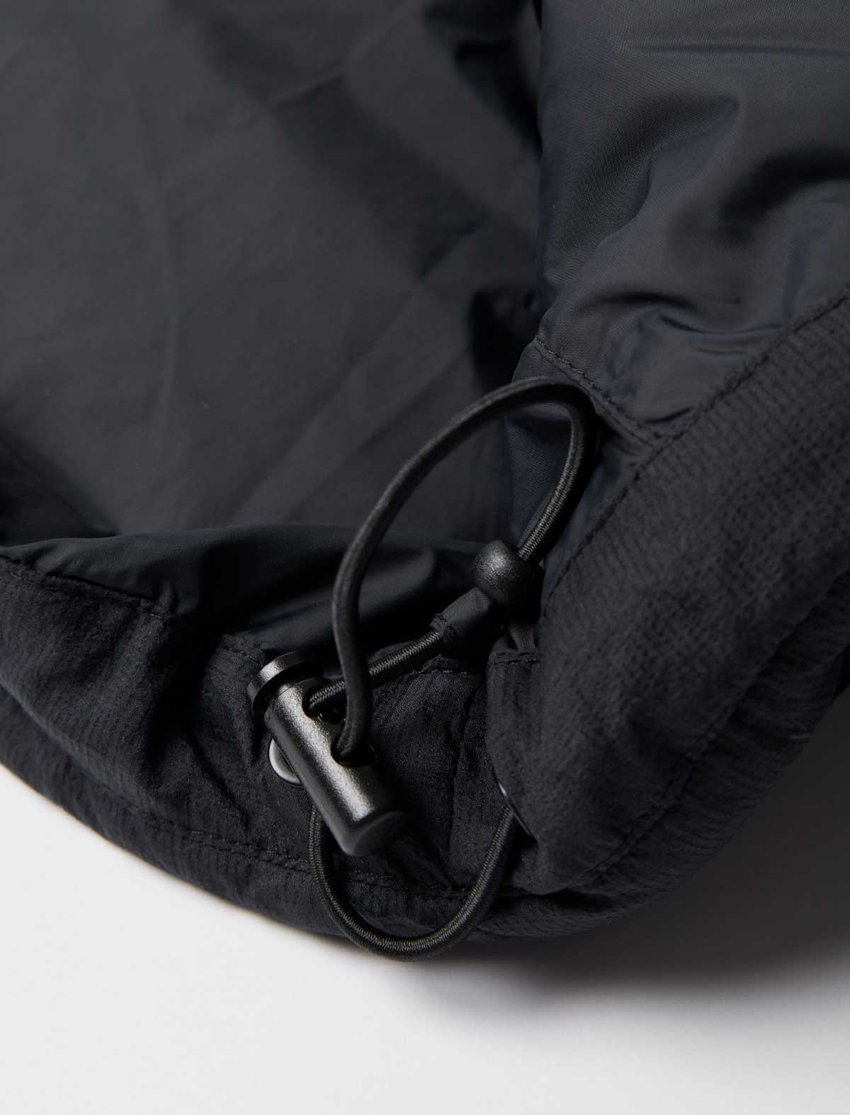 By Parra Boring Village Puffer Jacket Black toggle detail