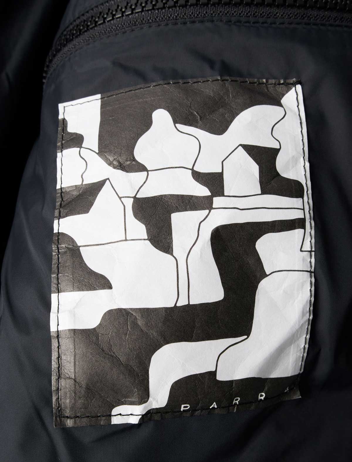 By Parra Boring Village Puffer Jacket Black inside label