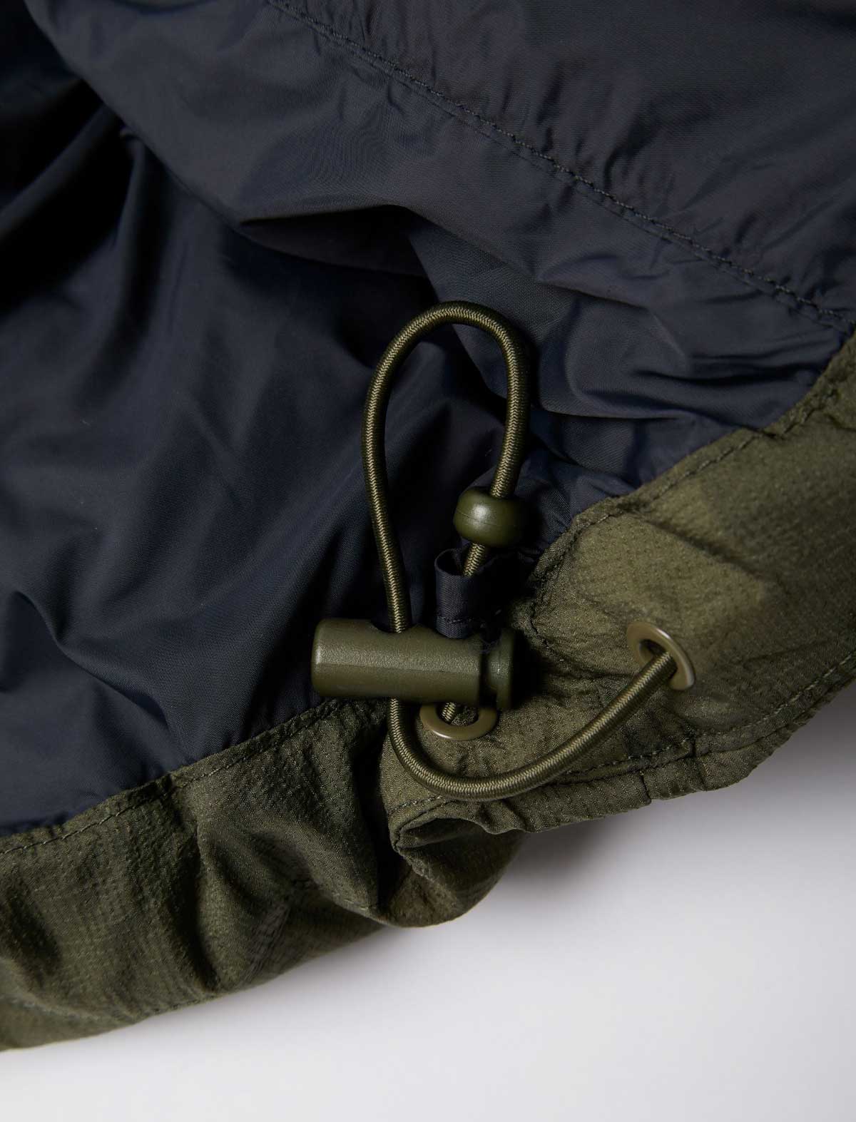 By Parra Boring Village Puffer Jacket Green toggle detail