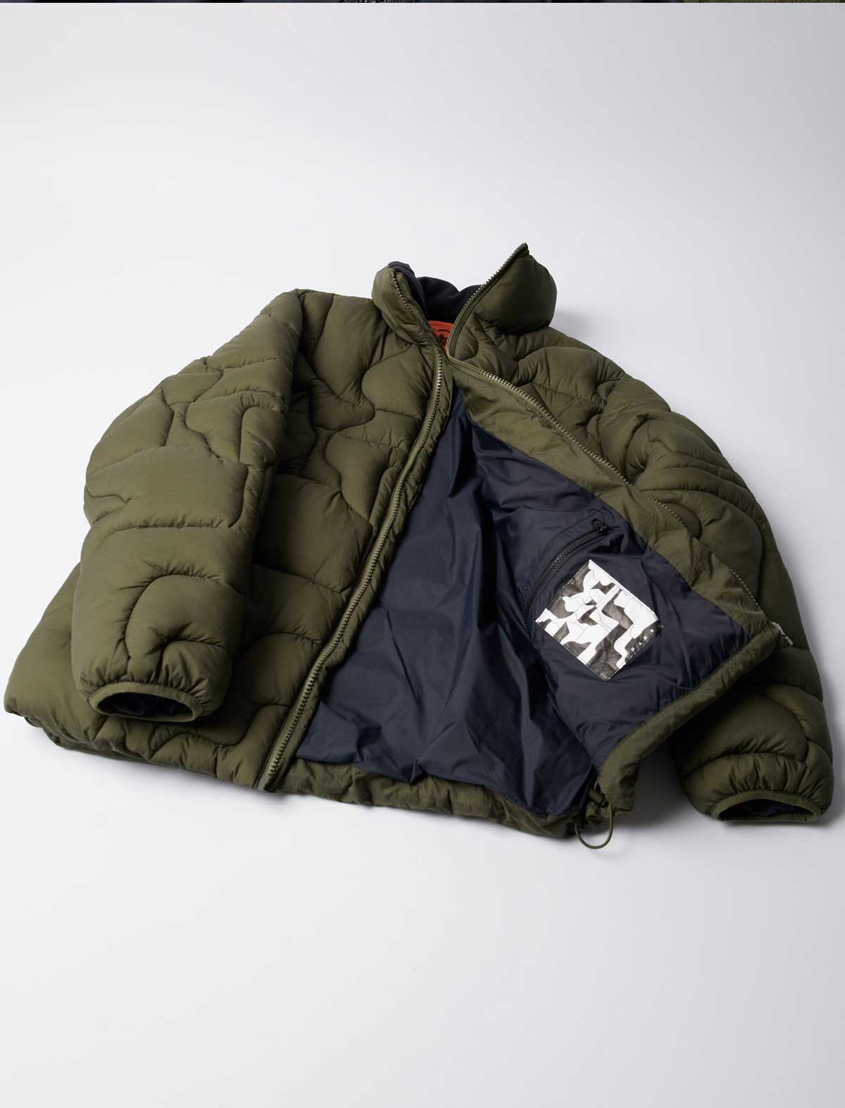 By Parra Boring Village Puffer Jacket Green full shot zip open