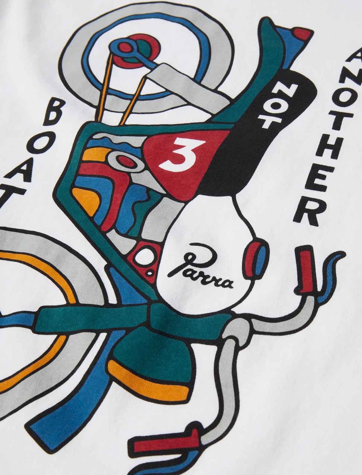 A close-up of a white graphic t-shirt featuring a colorful, stylized illustration of a bicycle with the word 'BOAT' on the left and 'ANOTHER' on the right. The brand name 'Parra' is visible in cursive script on a white section of the graphic.