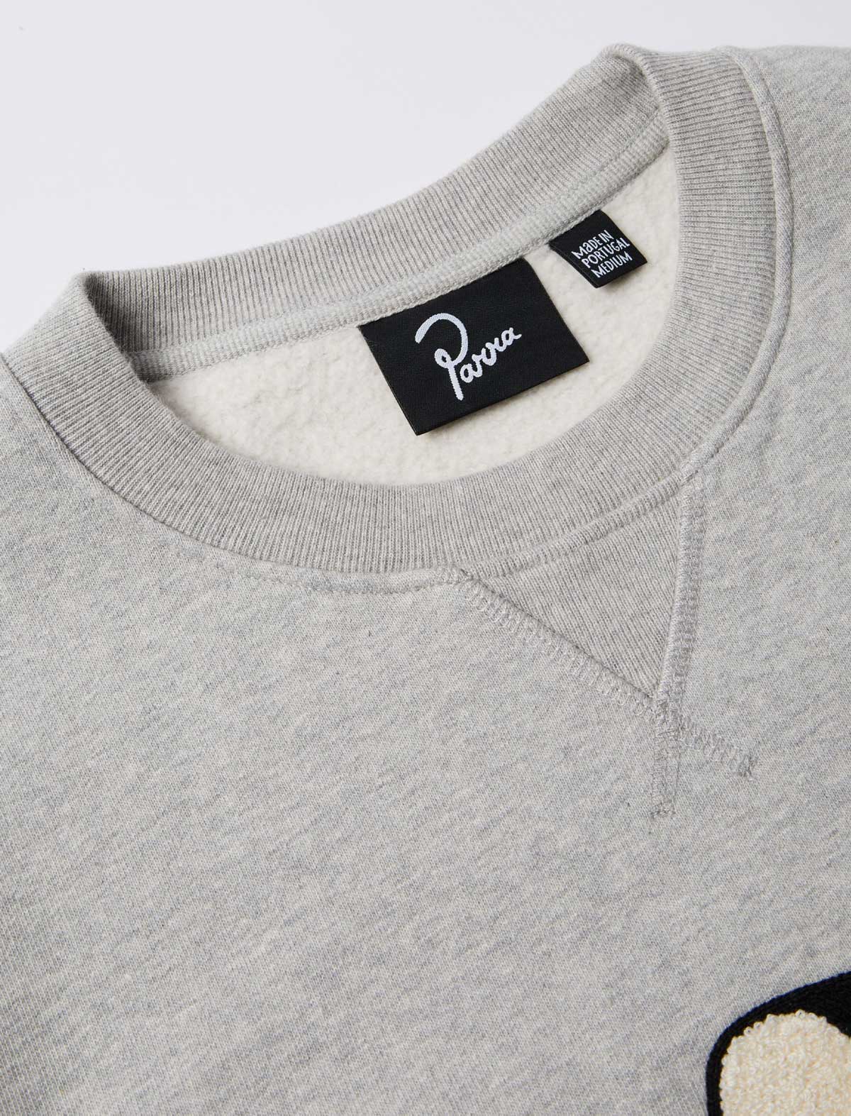 By Parra Rounded PAR Crewneck Sweatshirt Heather Grey collar and tag detail