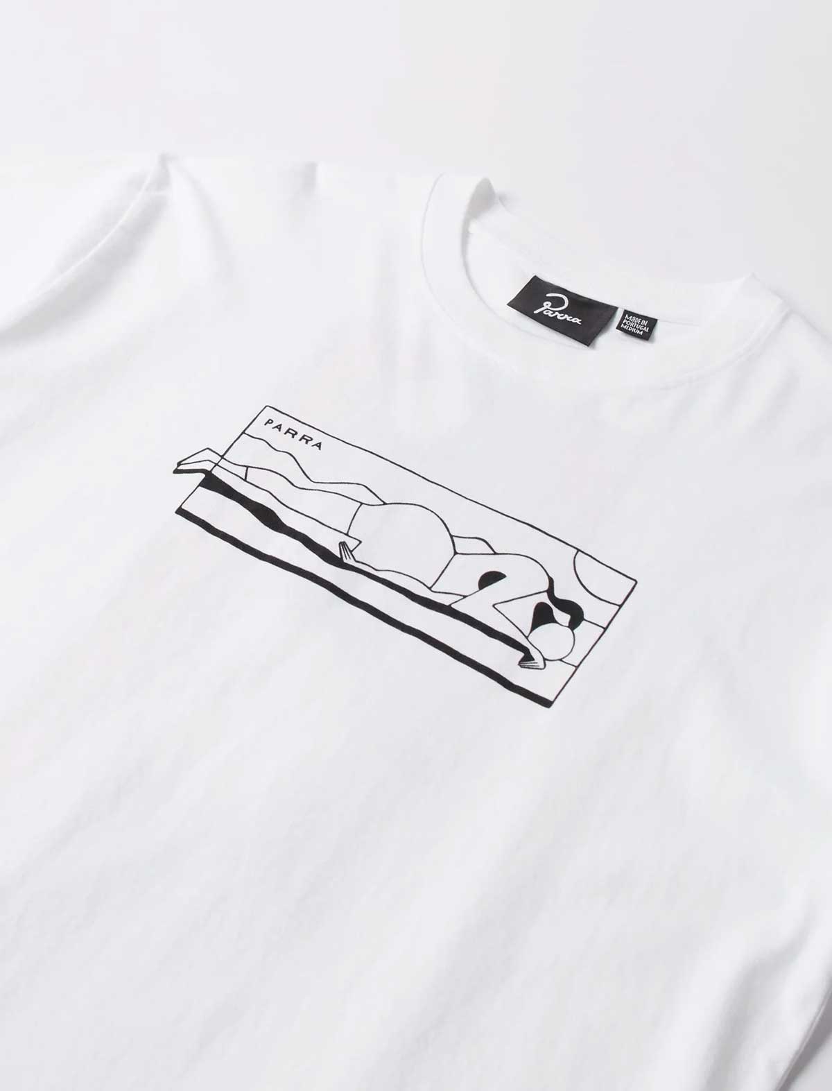 A close-up of a white crewneck t-shirt featuring a minimalist black line art graphic of a person lying on a beach towel, with the brand name 'Parra' visible on the inner neck label.