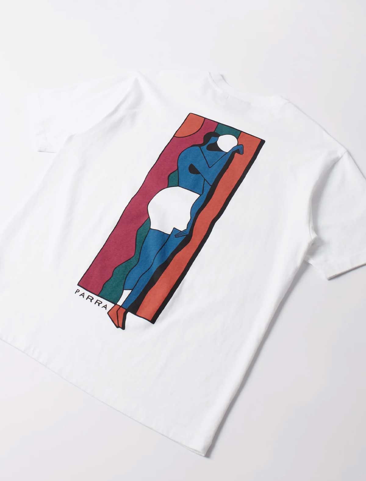 A white short-sleeve t-shirt featuring a large, colorful graphic print on the front. The graphic depicts an abstract, stylized figure in blue and white against a red, orange, and green geometric background, with the brand name 'PARRA' printed in black near the bottom left of the graphic.