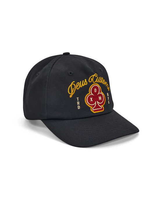 Deus Ex Machina Basto Black cap with yellow and red branding on a white background