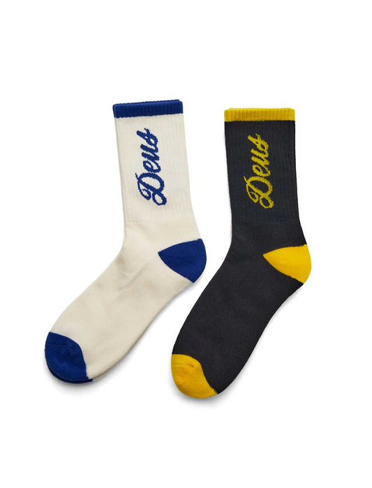 Two socks, one white with blue accents and one black with yellow accents, on a white background.