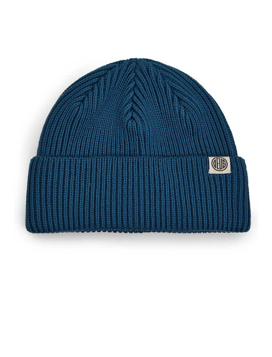 deus ex machina pill merino Blue beanie with a logo tag on a white background