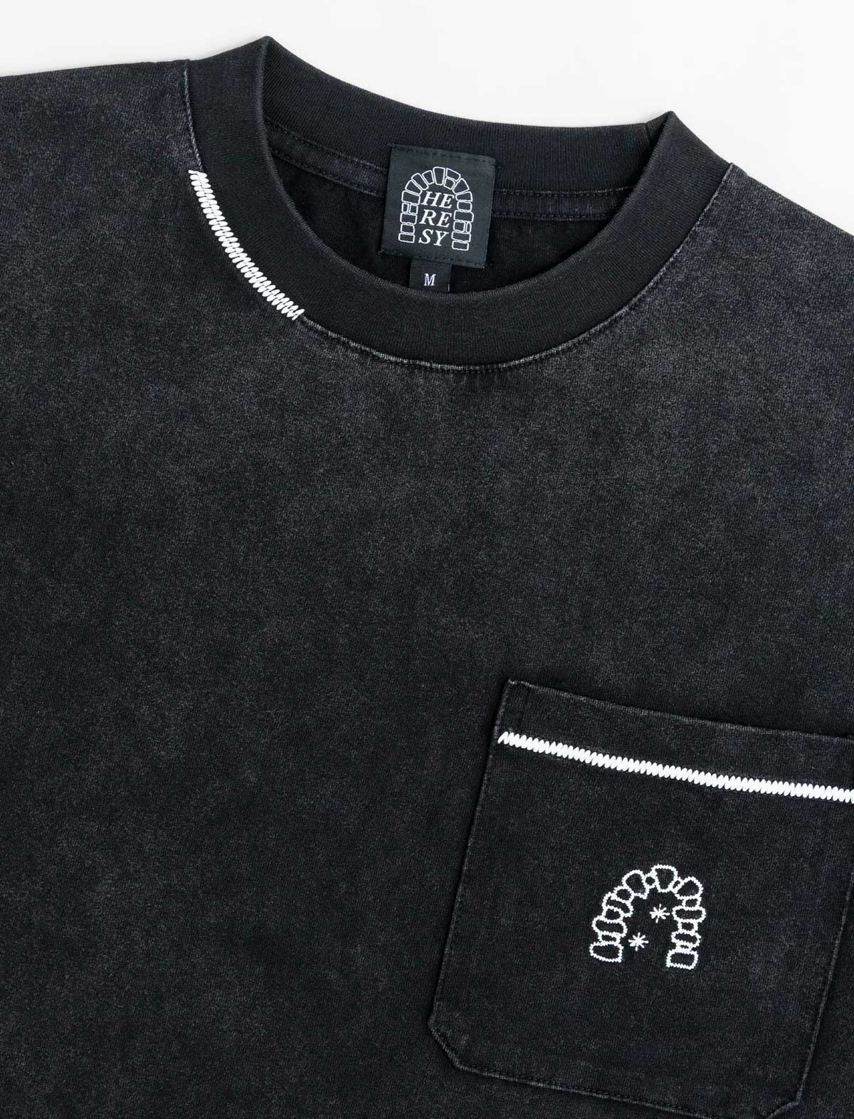 Black sweatshirt with a pocket and embroidered design on a white background
