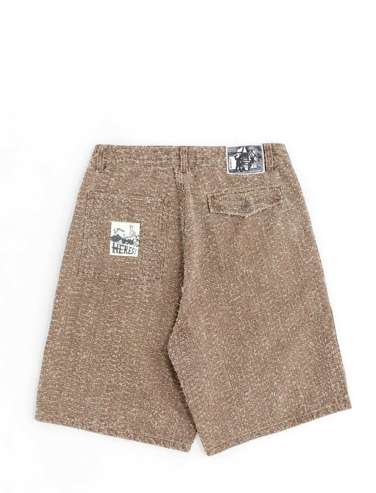 Brown shorts with brand logos on a white background