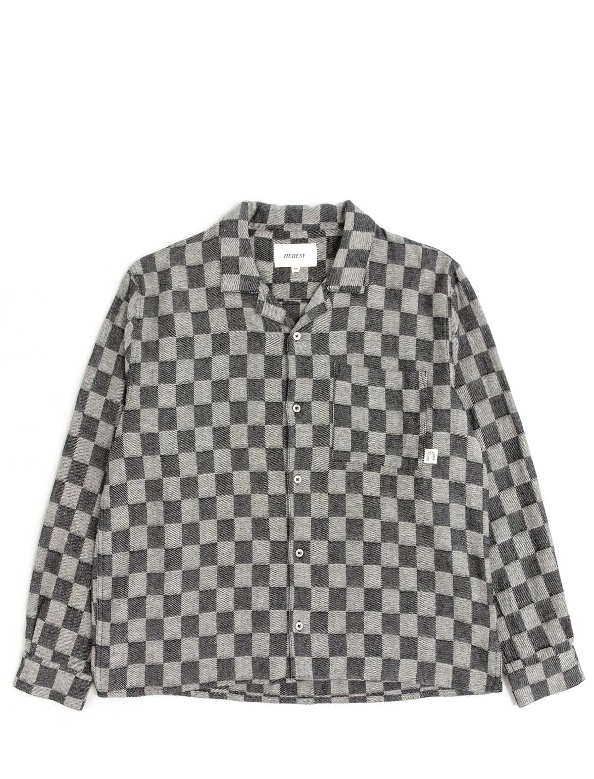 Checkered shirt with a brand label on a white background