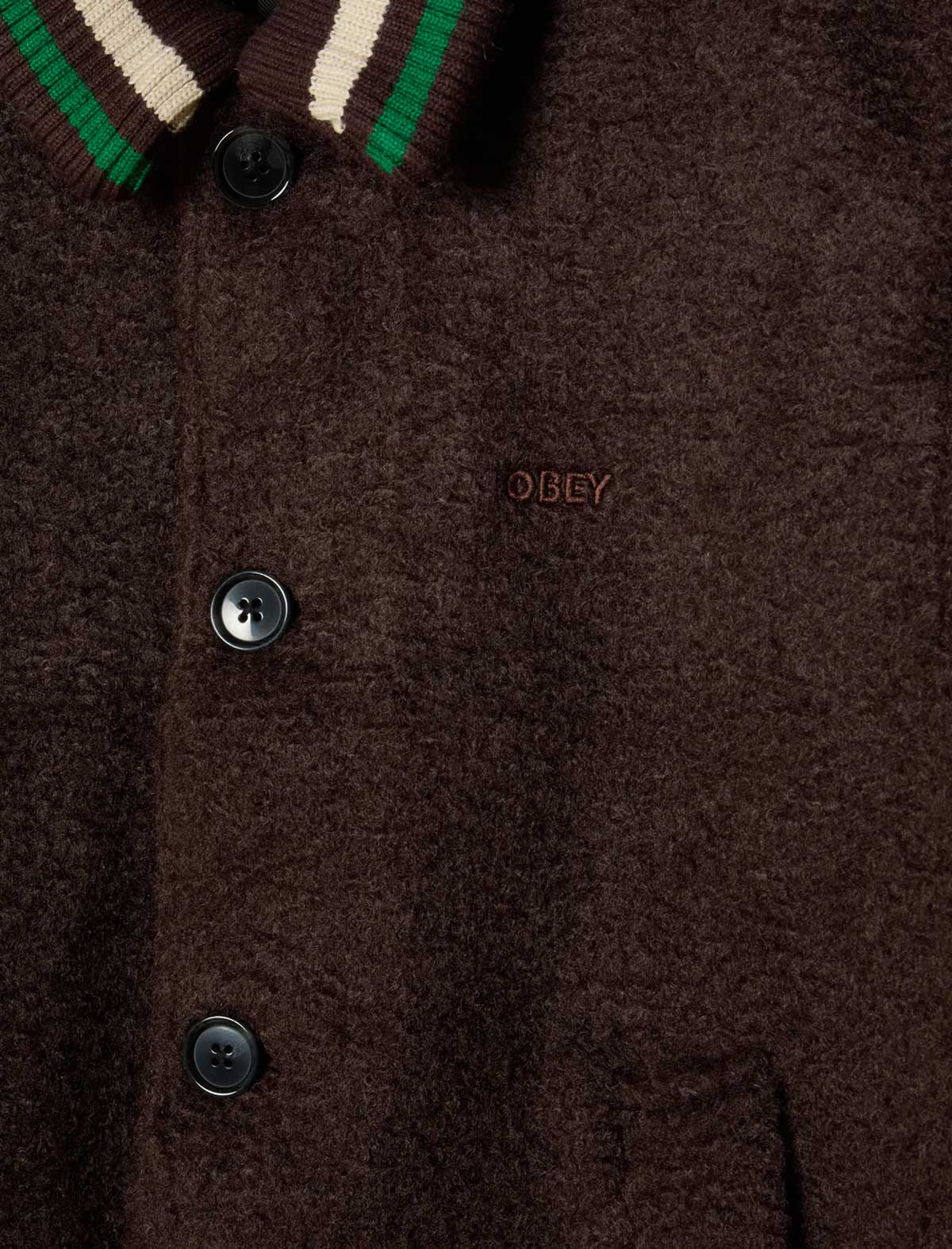 Brown jacket with button details and 'Obey' brand logo