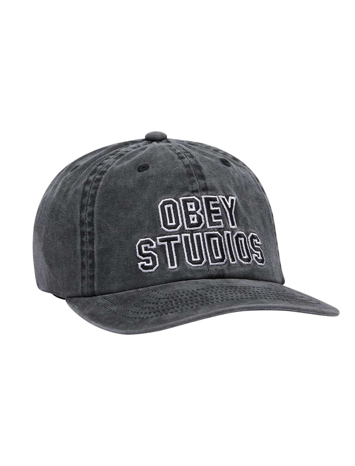 A baseball cap featuring an embroidered Obey Stusios graphic on the front, set against a plain white background.