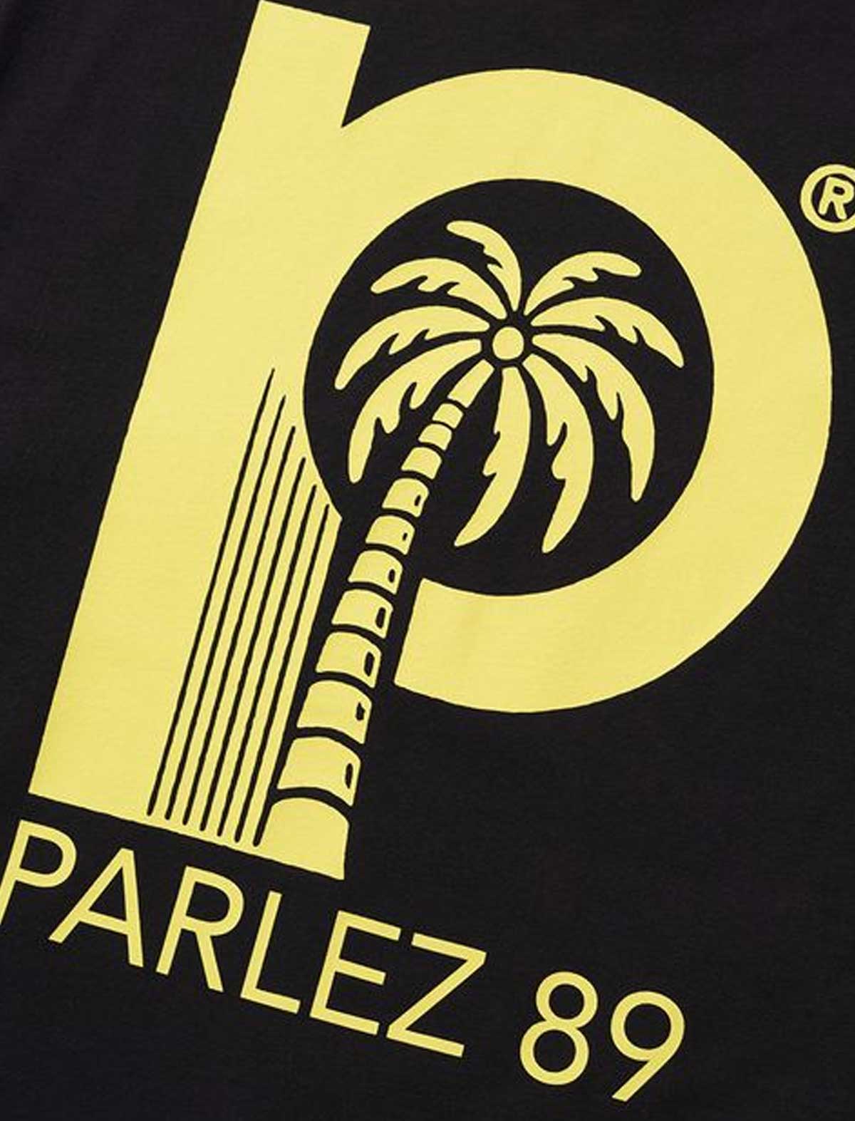 Black t-shirt with yellow 'Parlez 89' logo featuring a palm tree design.