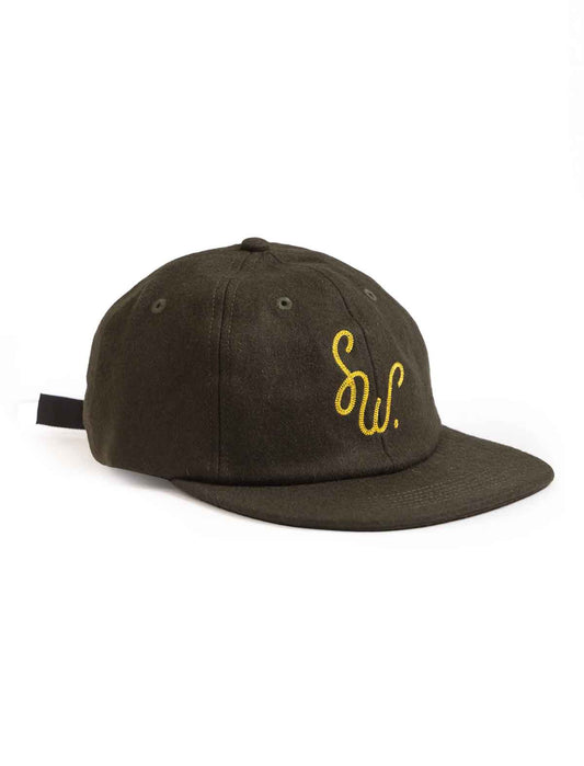 service works monogram SW cap in green on a white background