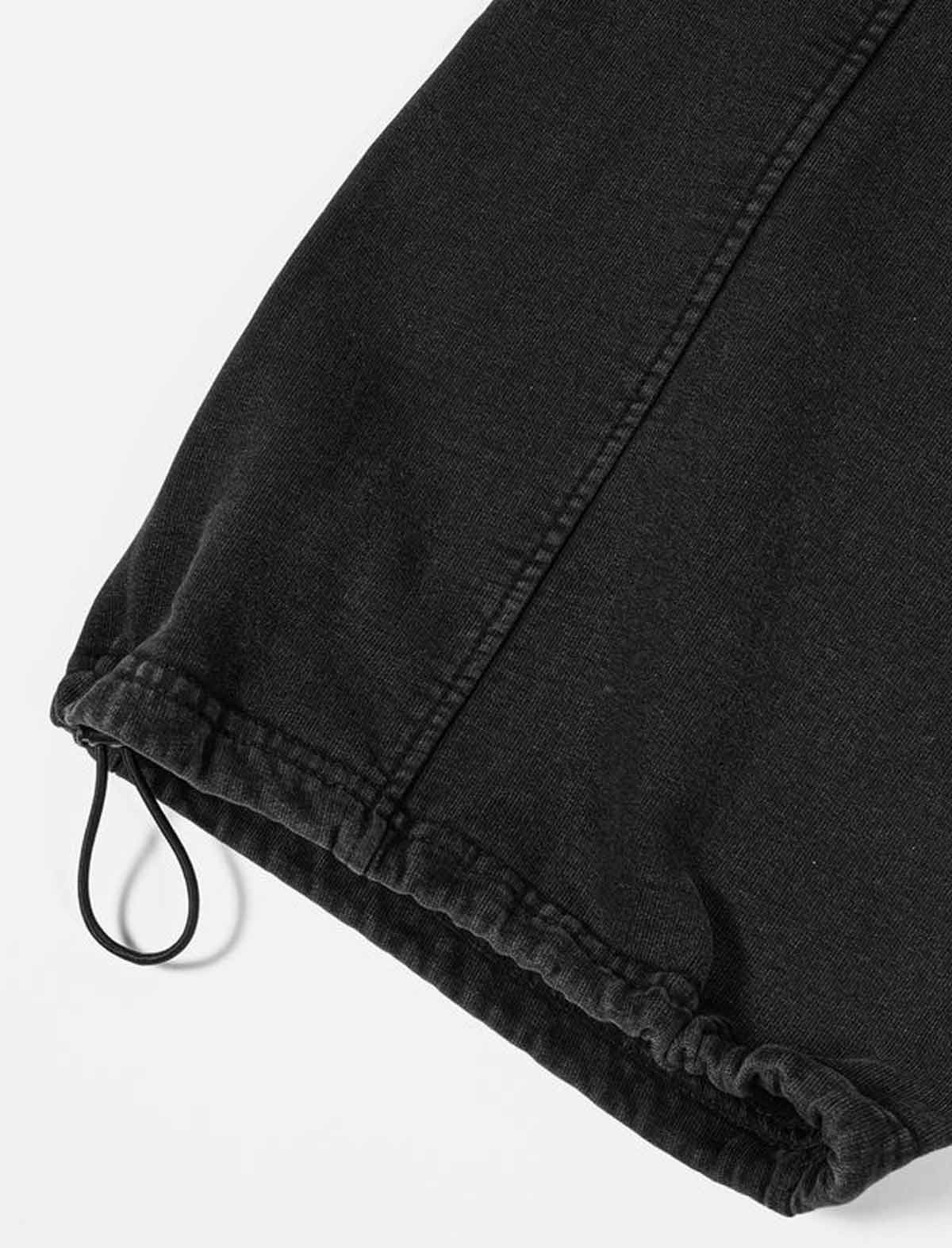 Wasted Paris x Umbro Black denim shorts with drawstring on a white background